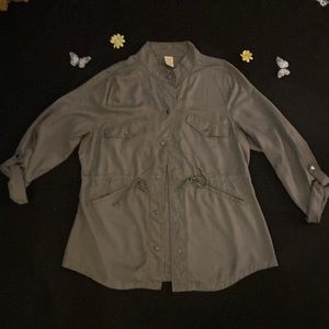 Must have light camouflage green snap down shirt with drawstrings and pockets!